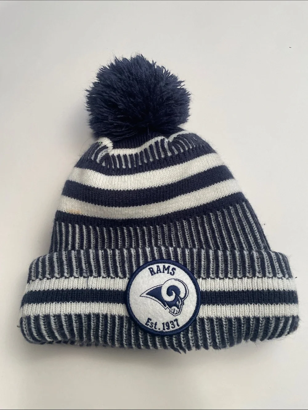 New Era Navy and White Striped Pom Beanie for the Youth